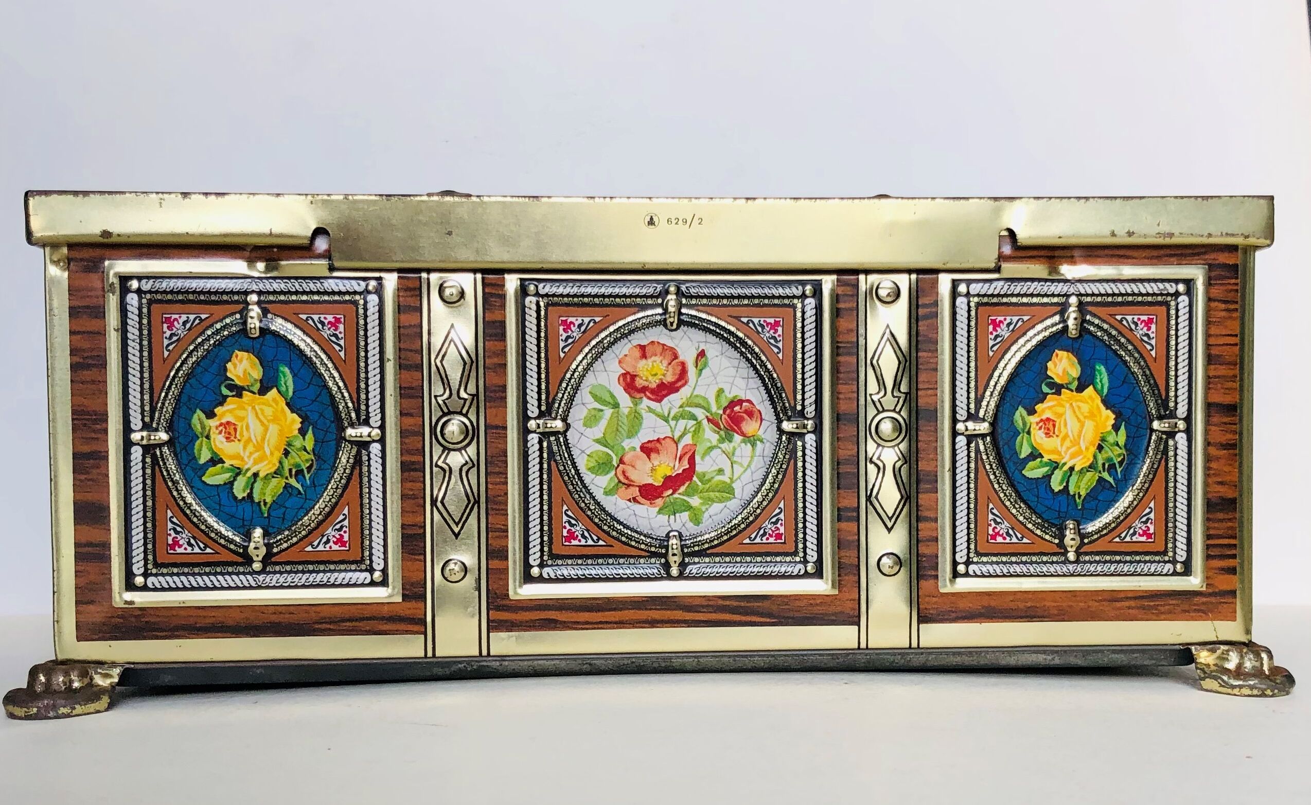 Old metal box decorated with flowers