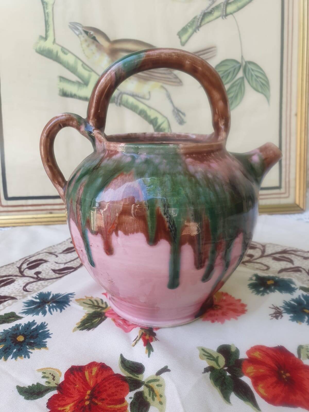Jug pitcher Provençal earthenware glazed with pink and green glaze.