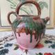 Jug pitcher Provençal earthenware glazed with pink and green glaze.