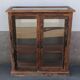 Antique wooden display cabinet with 2 doors