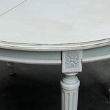 Louis XVI style table with extendable element.