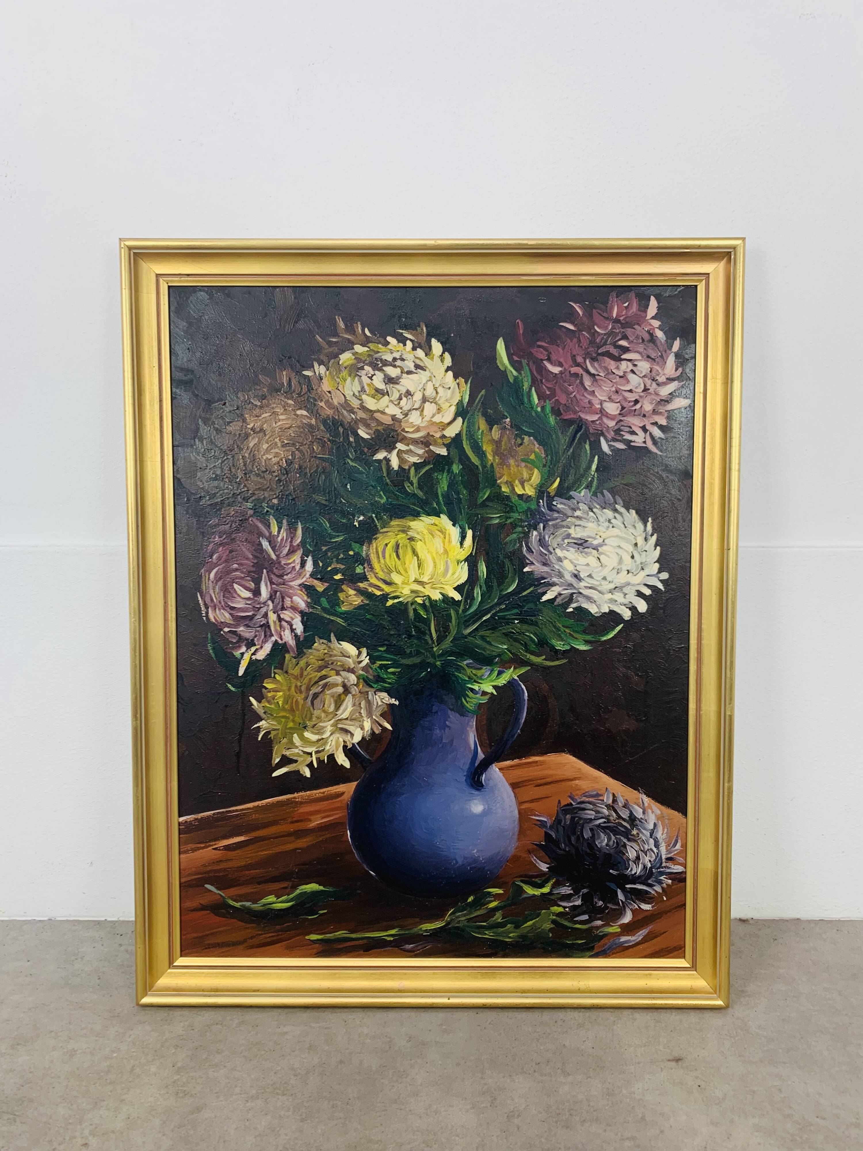 Still life painting of a bouquet of flowers, golden frame