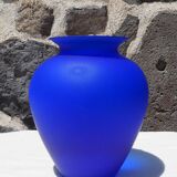 Blue polished glass vase.