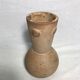 Former brown ceramic vase