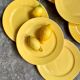 12 yellow earthenware dinner plates