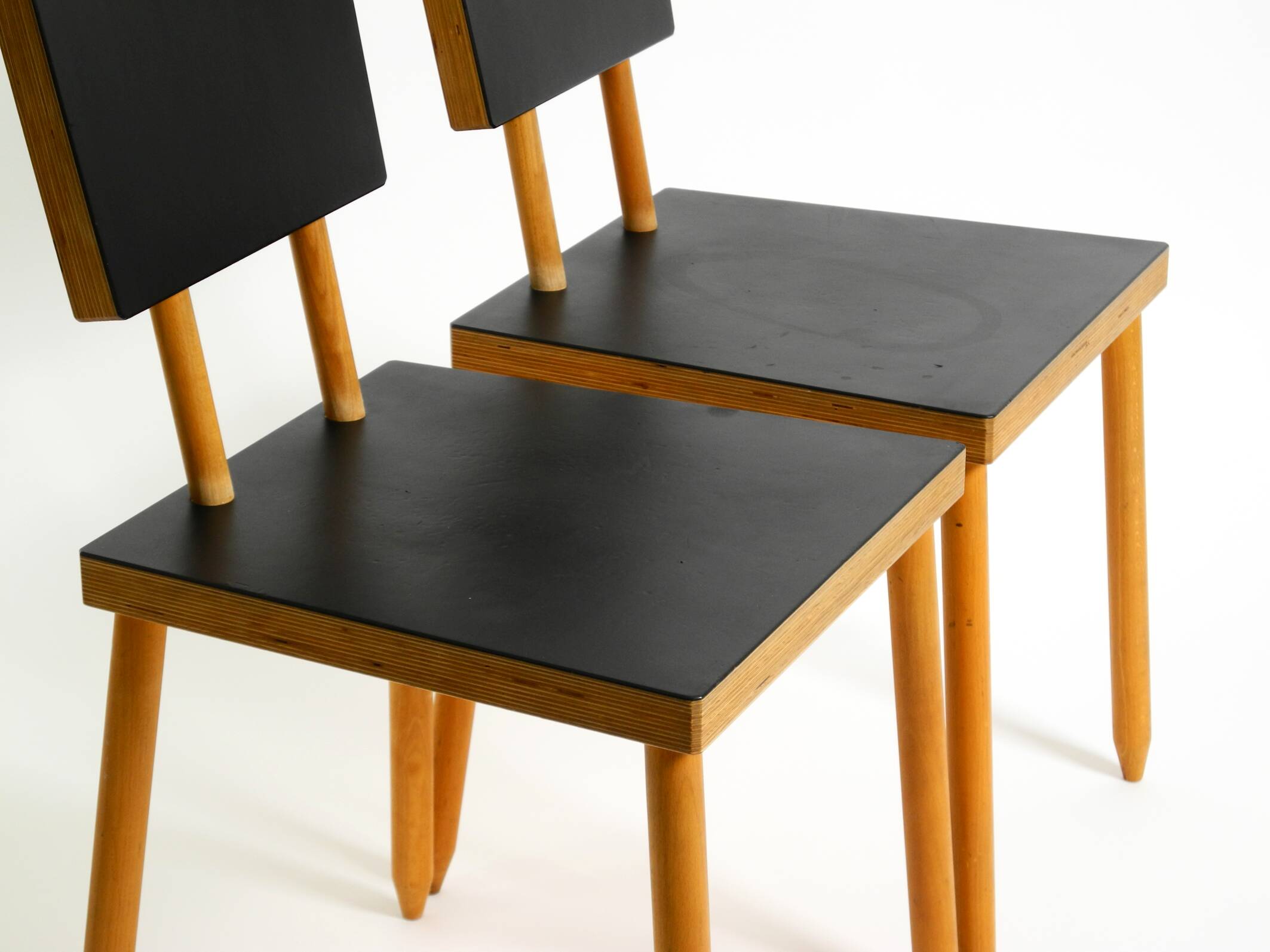 Two rare demountable plywood chairs by Axel Kufus model Stöcke for Atoll