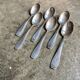 6 silver metal spoons