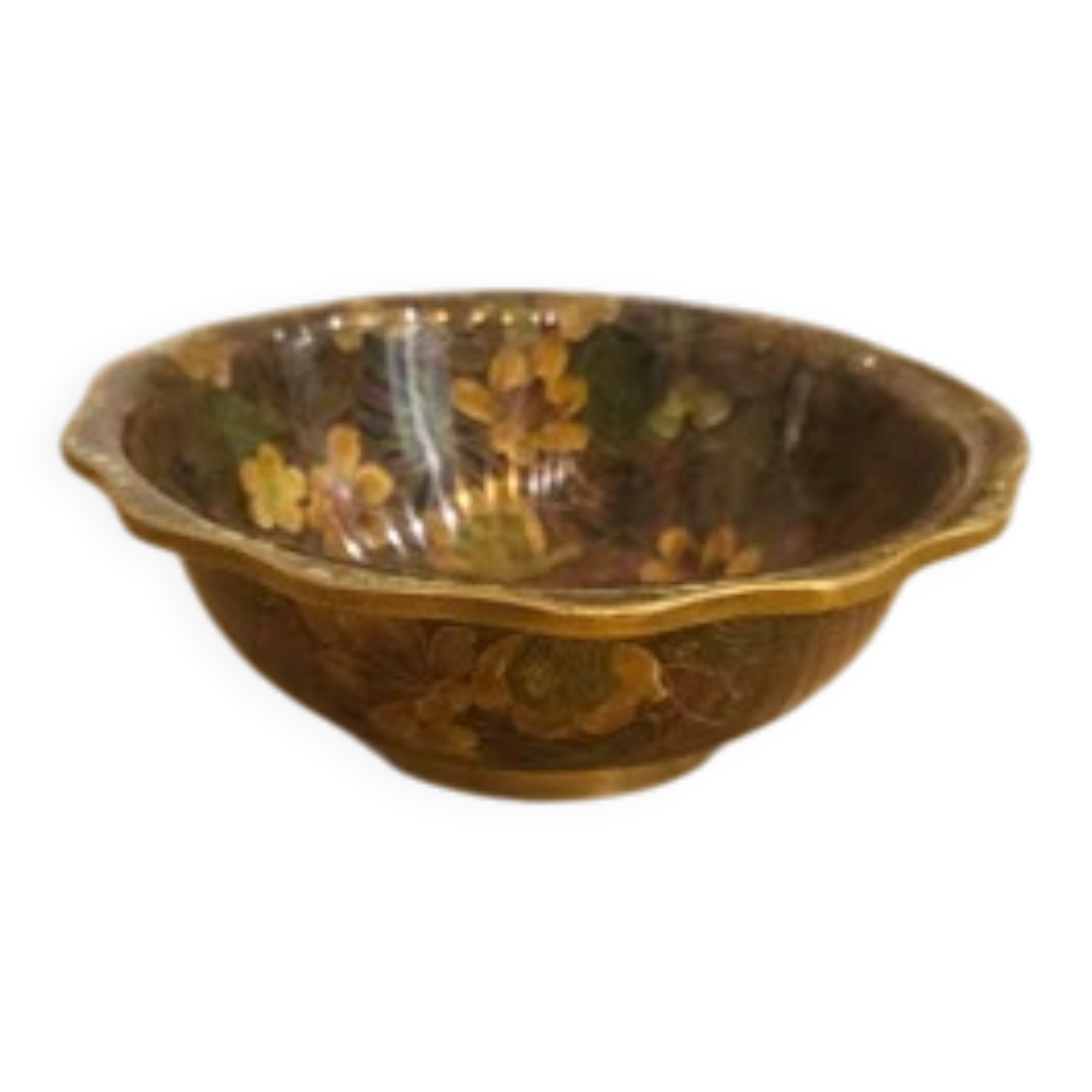 Vintage Asian brass bowl with floral decoration.