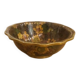 Vintage Asian brass bowl with floral decoration.