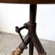 Tripod workshop stool in turned wood and cast iron — circa 1900