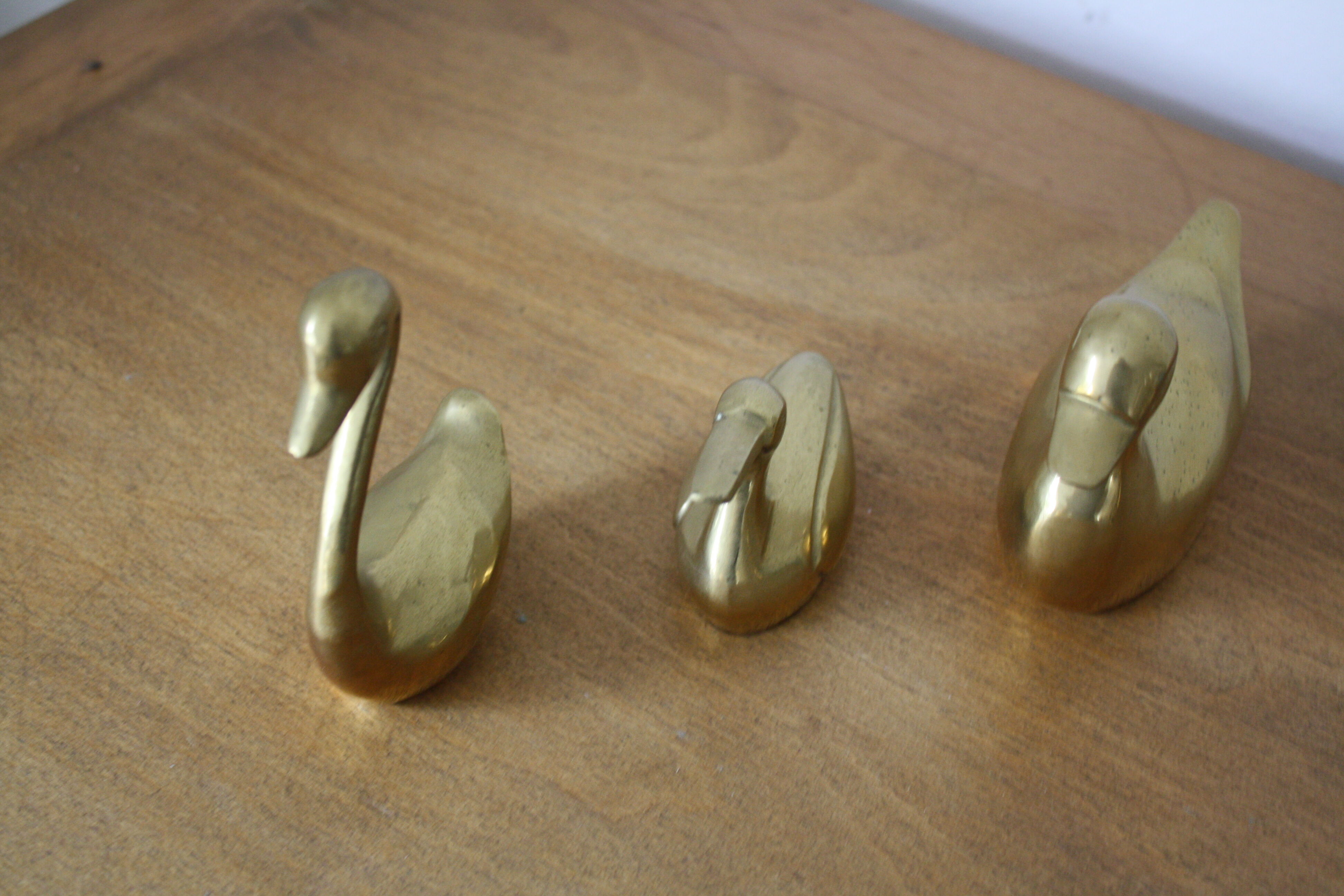 Set of 2 ducks and 1 brass swan