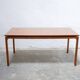 Extendable teak dining table by Gérard Guermonprez for Magnani editions