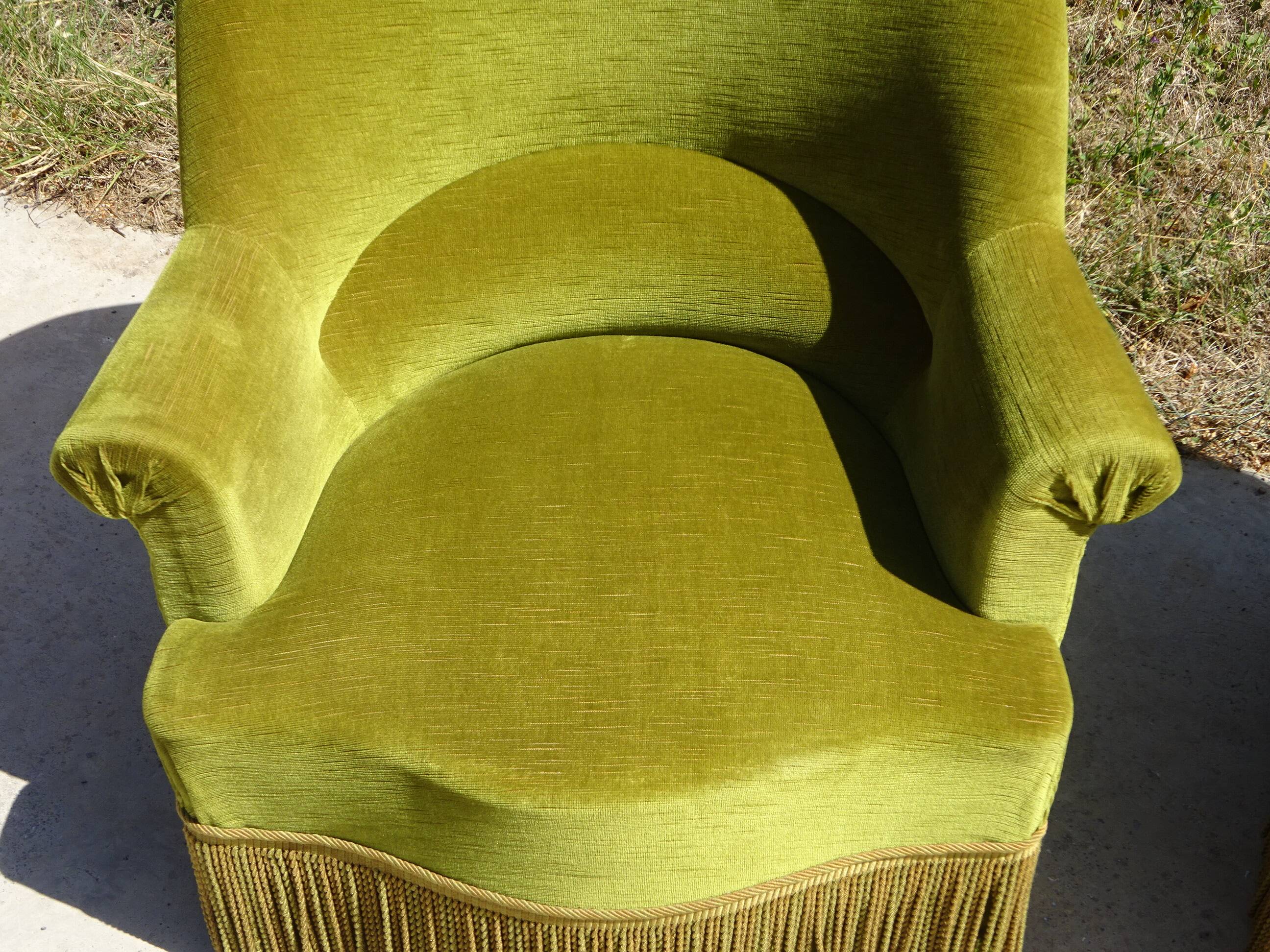 Paire de fauteuils crapauds en velours vert