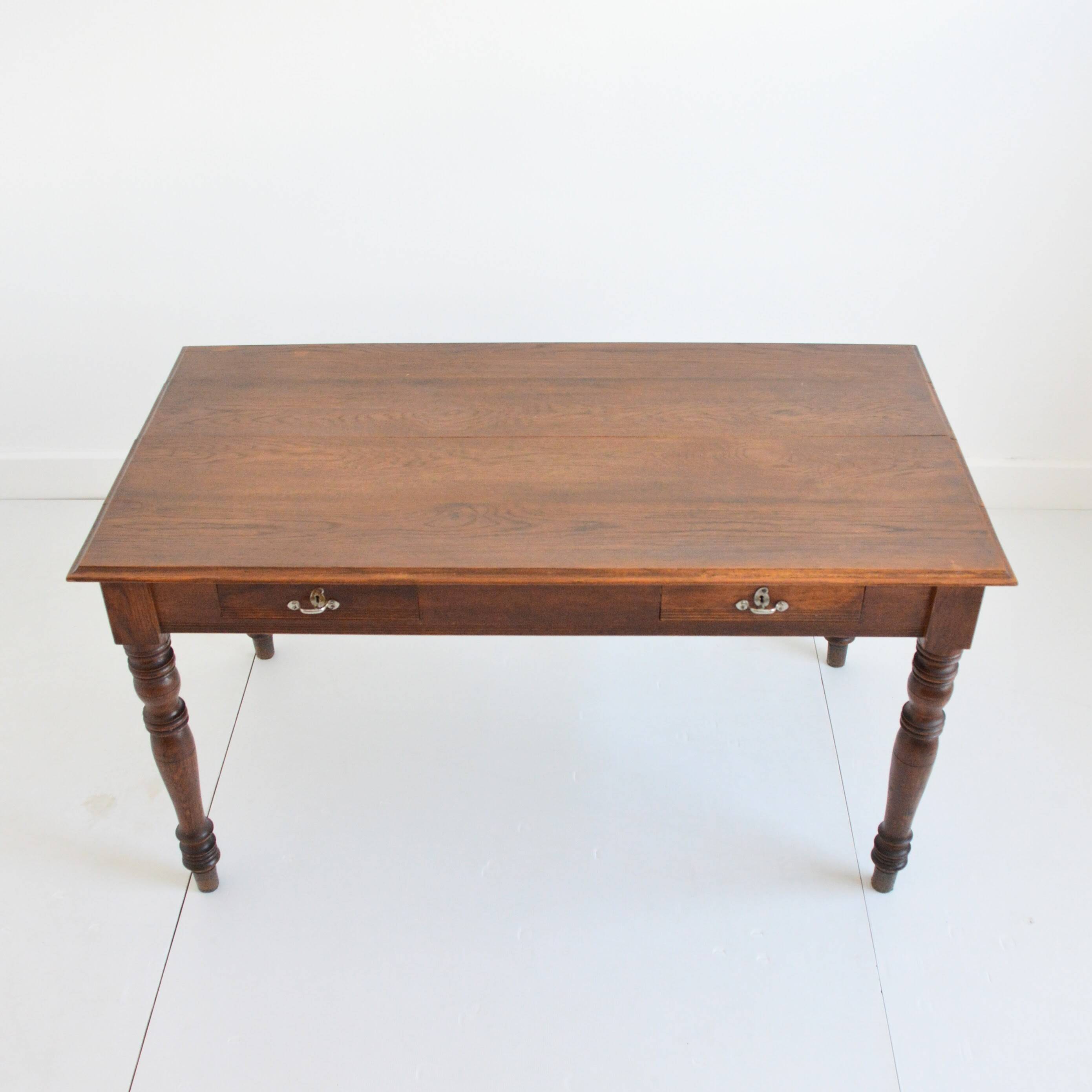 Farm table with extensions from the early 20th century.