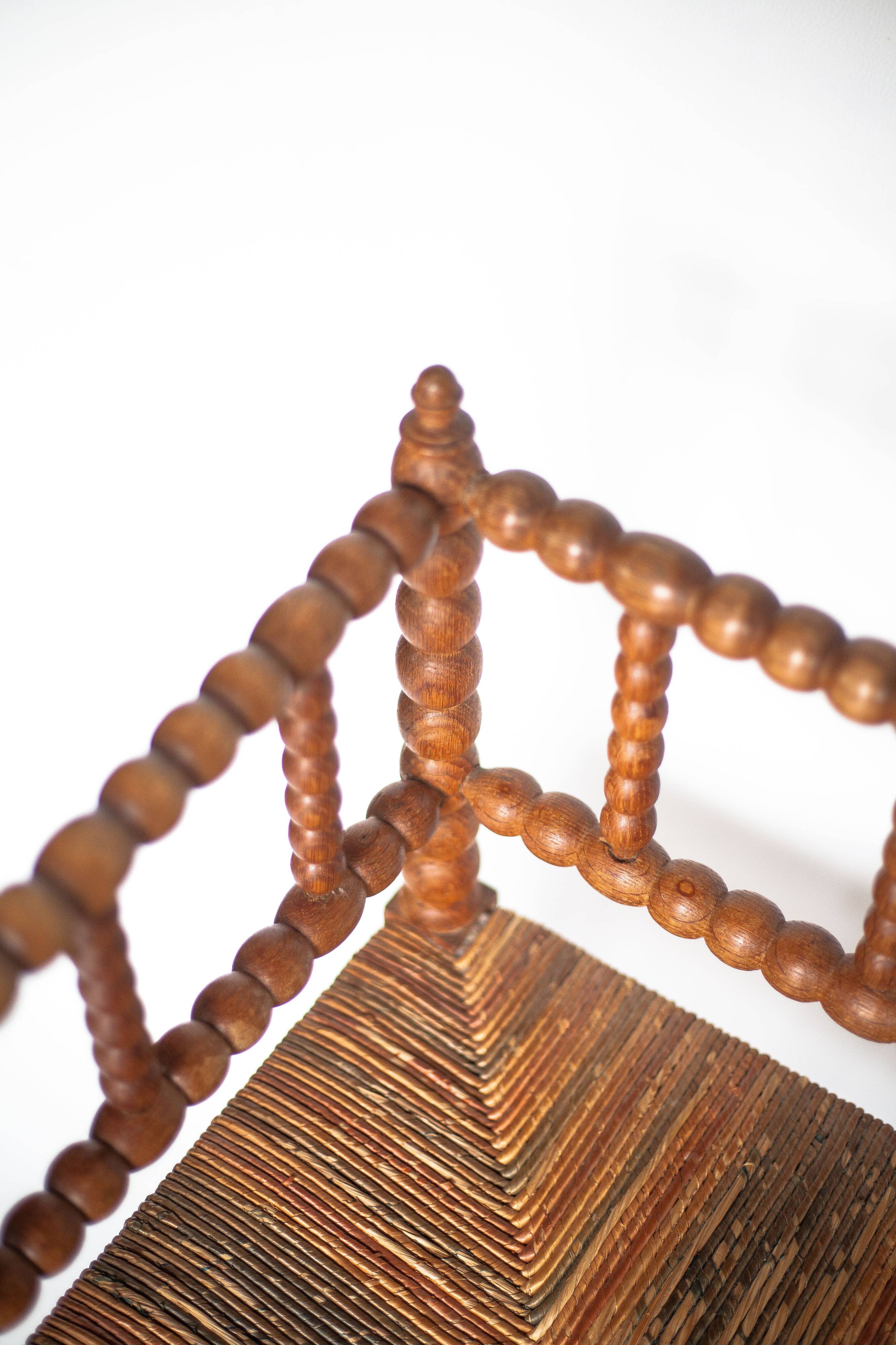 Wooden and caned corner chair, antique bobbin chair, occasional chair.
