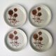Set of 4 dessert plates and 1 “Thistle” bowl