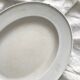 Vintage marbled white and blue enameled sheet metal oval dish