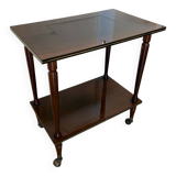Vintage side table in varnished wood, with casters and gold threads