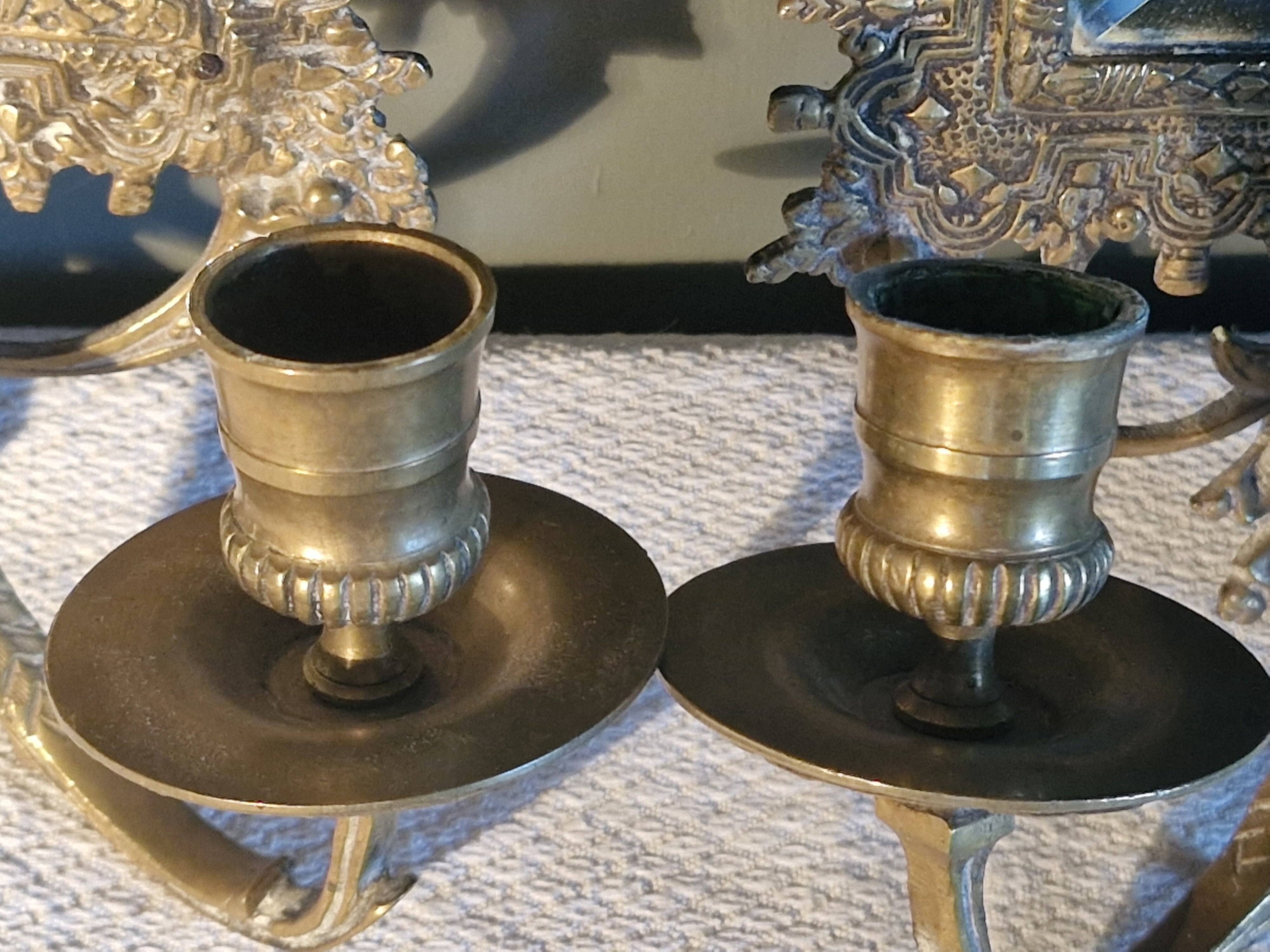 Pair of mirror sconces/candle holders in 19th-century bronze.