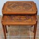 Pair of Malagasy nesting tables in carved wood, signed, m.o.f, 1955