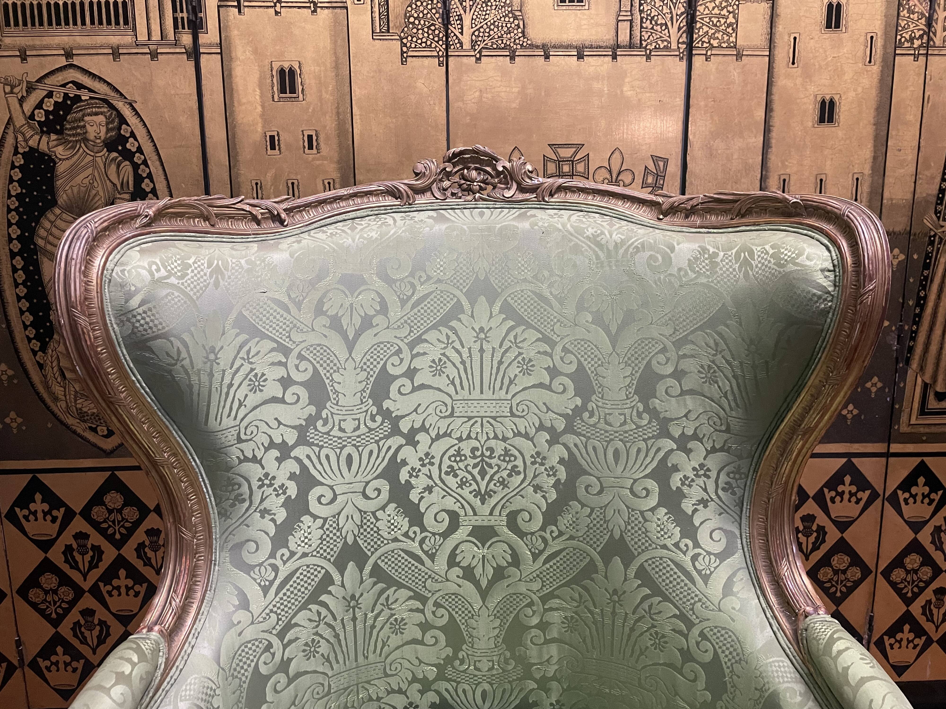 Louis XV golden eared armchair