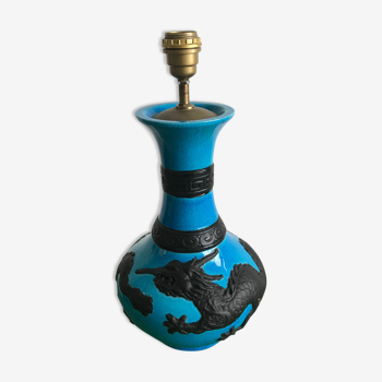 Turquoise ceramic dragon lamp and patterns painted in matte black