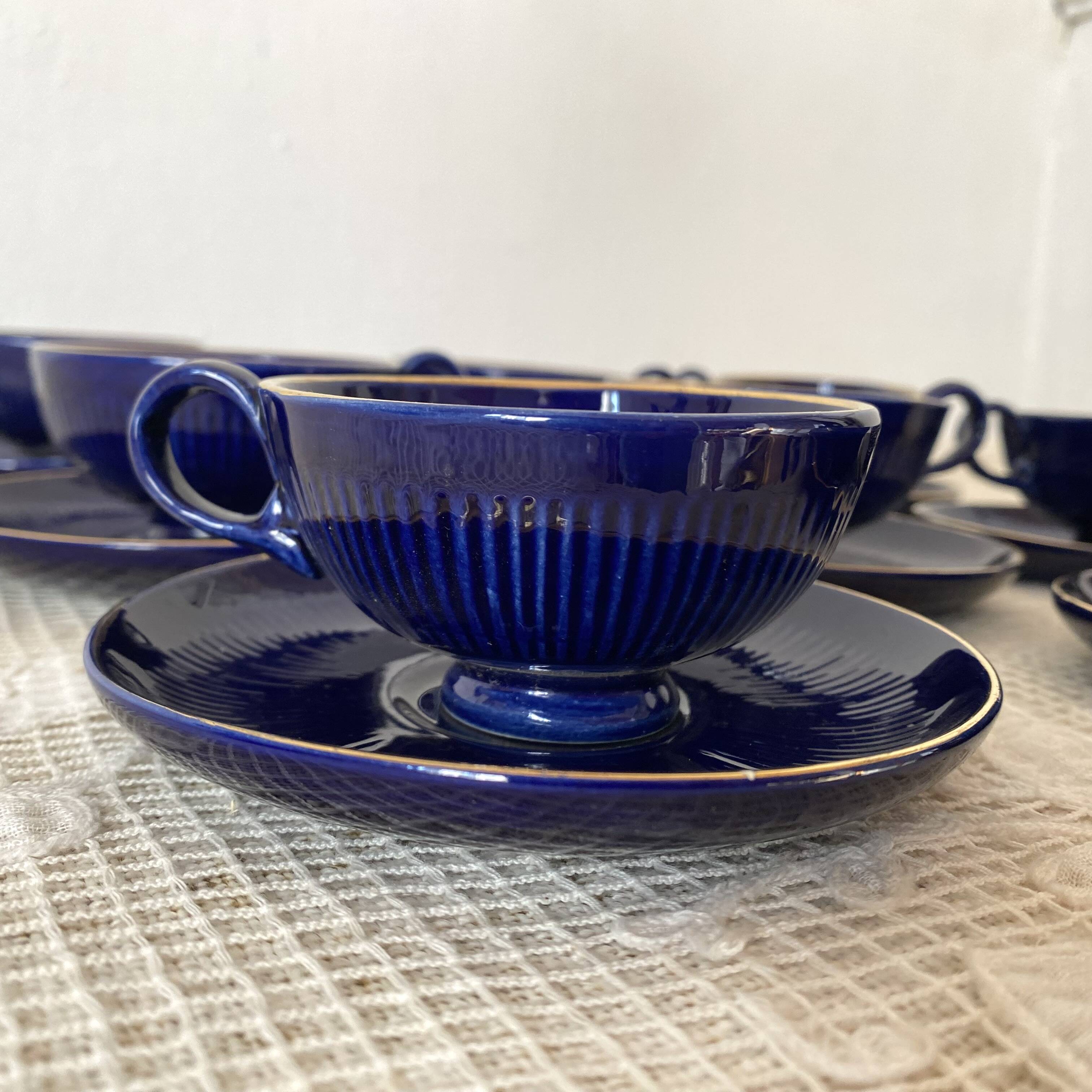 Midnight blue and gold coffee cups and saucers