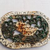 Cast iron dish underside with duck