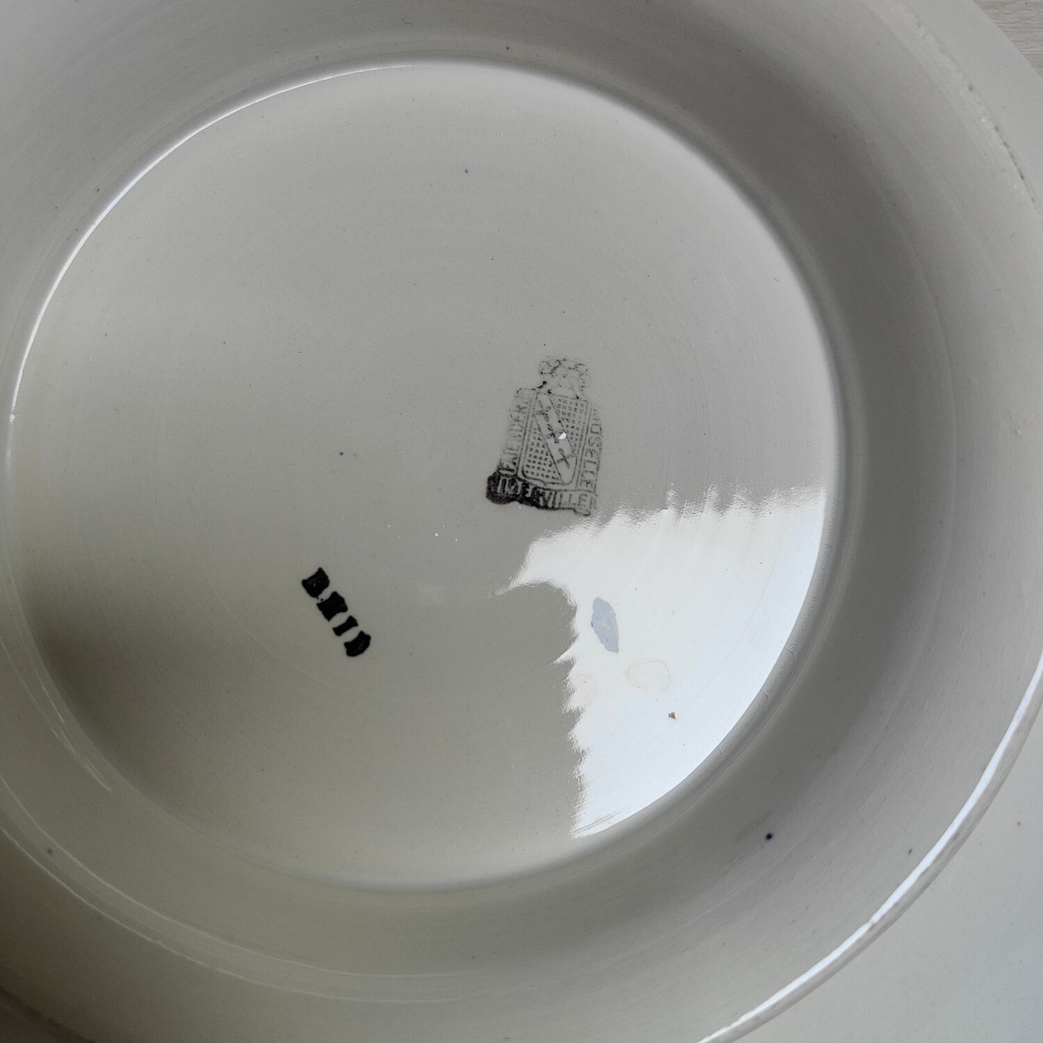 Plate mounted iron earth