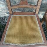 Pair of old chairs with brass elements