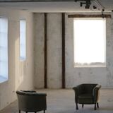 Mid-20th century, pair of Danish shell lounge chairs in green velvet, 1940s.