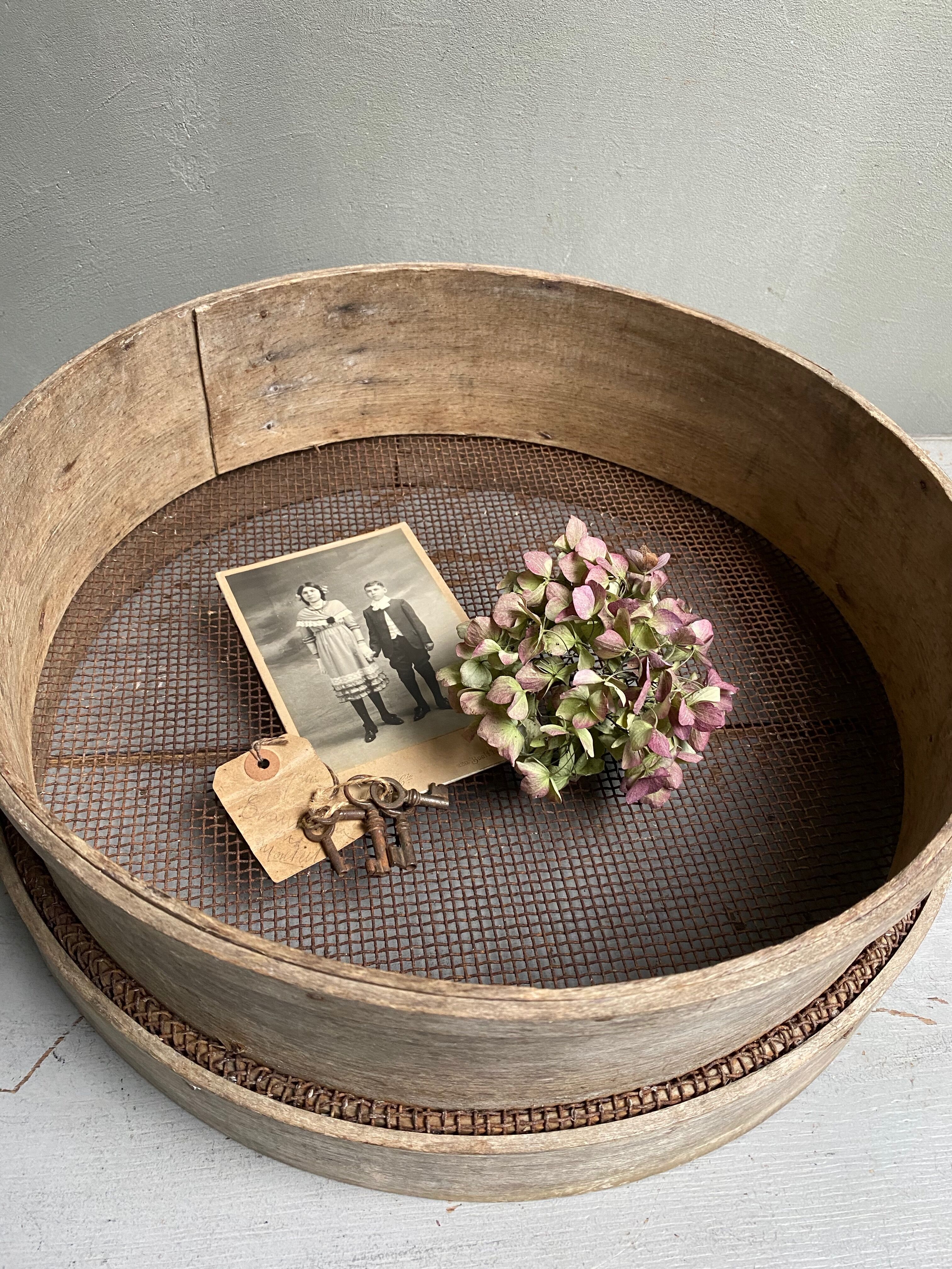 Old large wooden sieve
