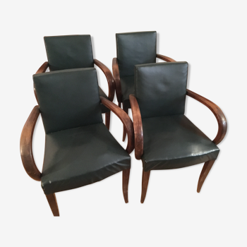 4 green skai bridge chairs