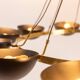 Contemporary 10-light chandelier or pendant light, brass and black lacquer