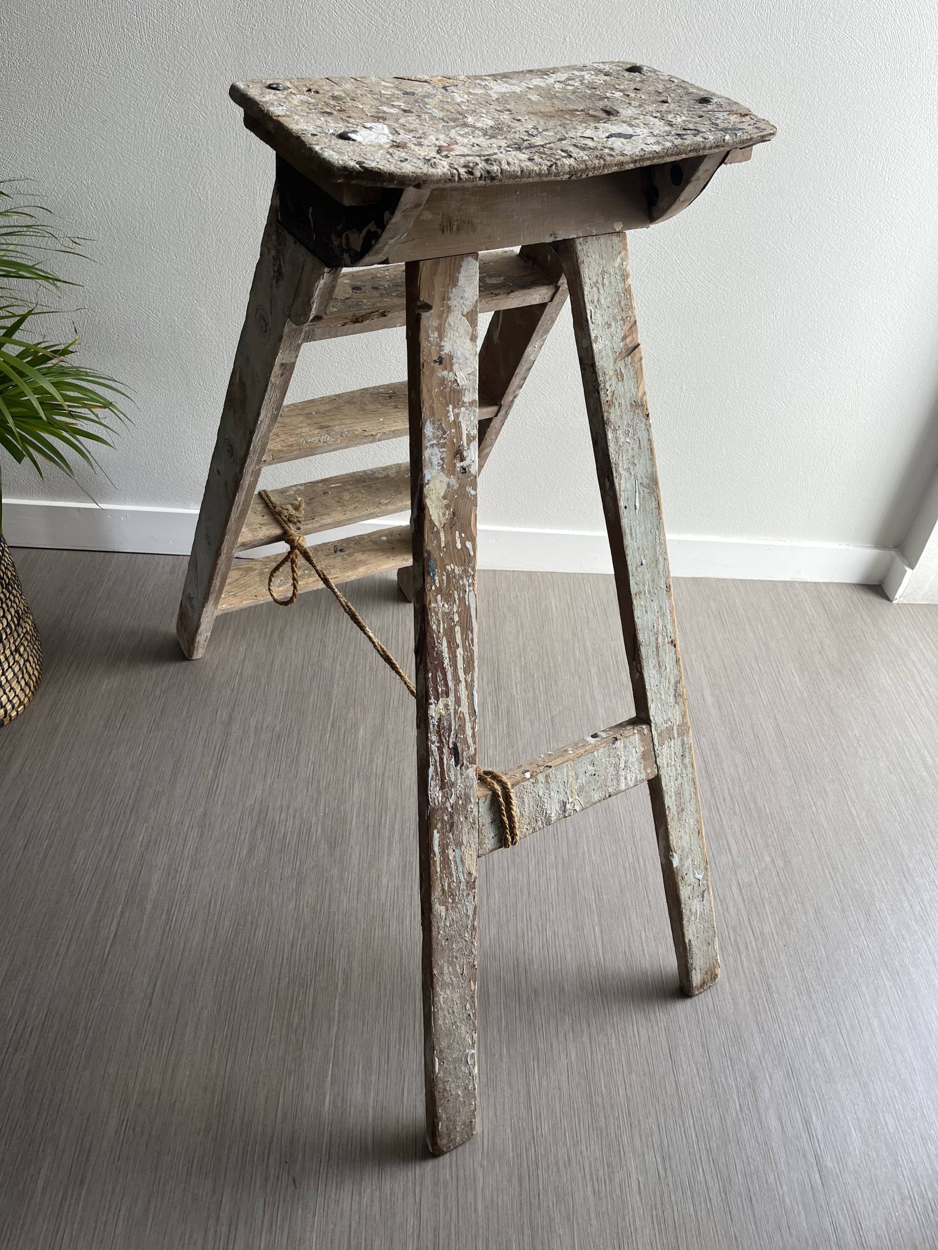 Former stepladder of patinated wood painter
