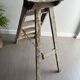 Former stepladder of patinated wood painter