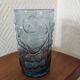 Blue glass with fruit relief decoration