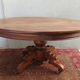 English oval table with 19th century mahogany extensions
