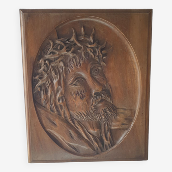 Face of Christ carved on wood