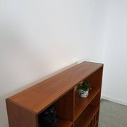 Deens teak vakkenkast met lades en hoge poten, vintage wandkast
