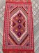 Tapis rouge à motifs berbères multicolores tissé  à mains