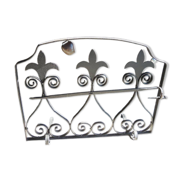 Old wrought iron fleur-de-lis fire screen