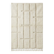 Berber rug with a white graphic pattern.