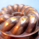 Old copper cake pan, braided crown, kitchen utensil