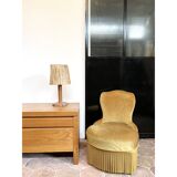Lamp base in saddle stitched leather and raffia lampshade.