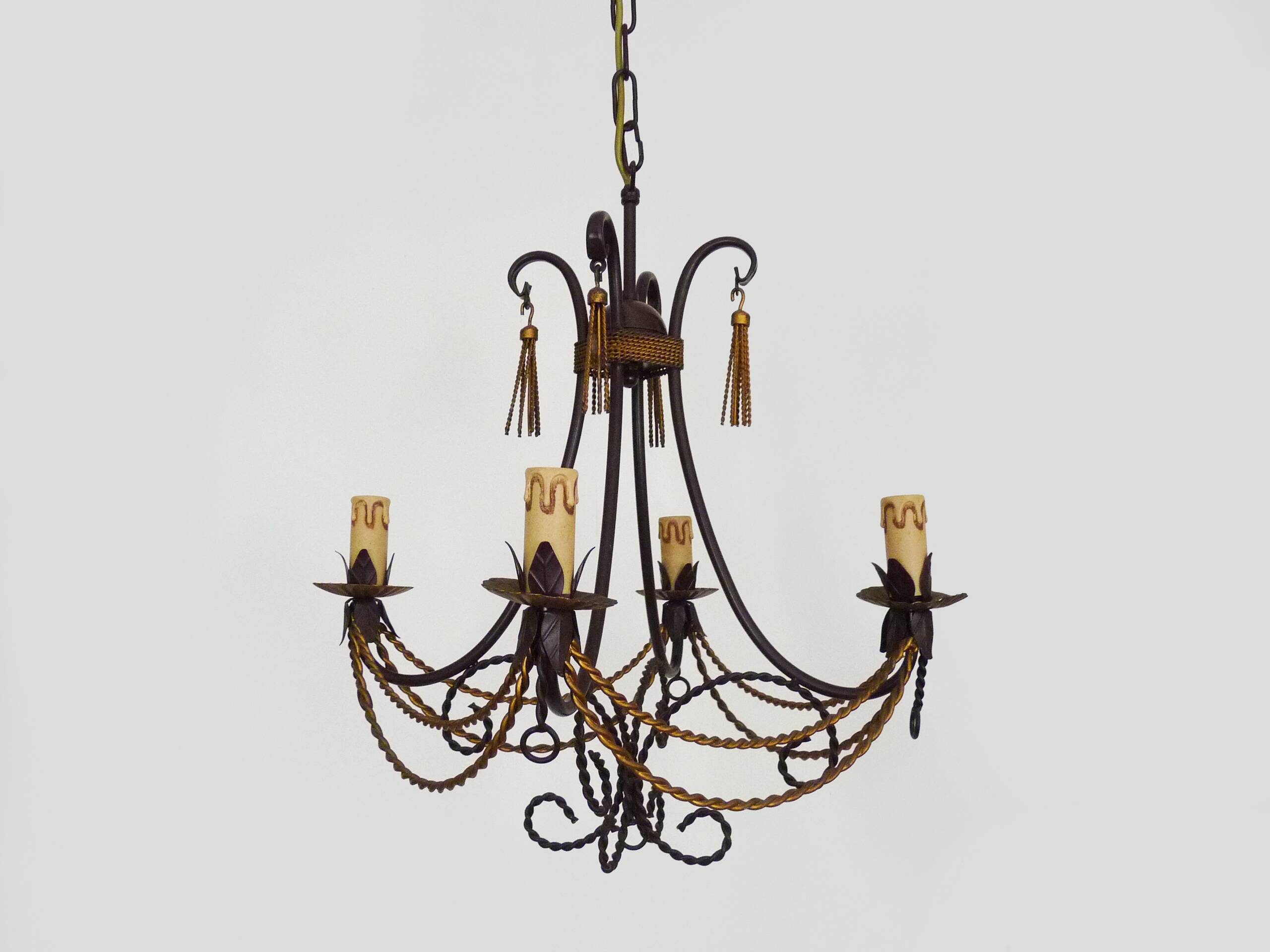 Vintage 4-arm, 4-light chandelier from the 1980s. Brown and gold metal.