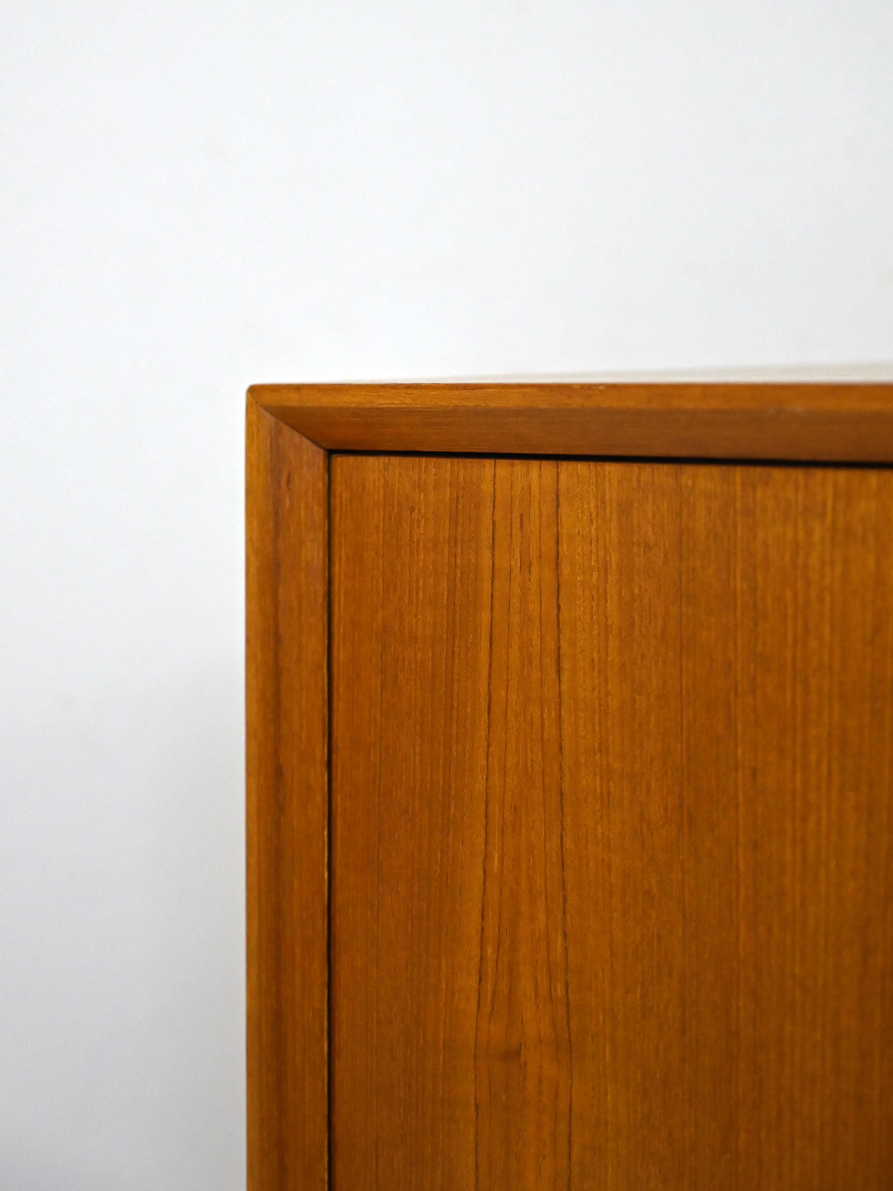 1960s teak cabinet with hinged doors