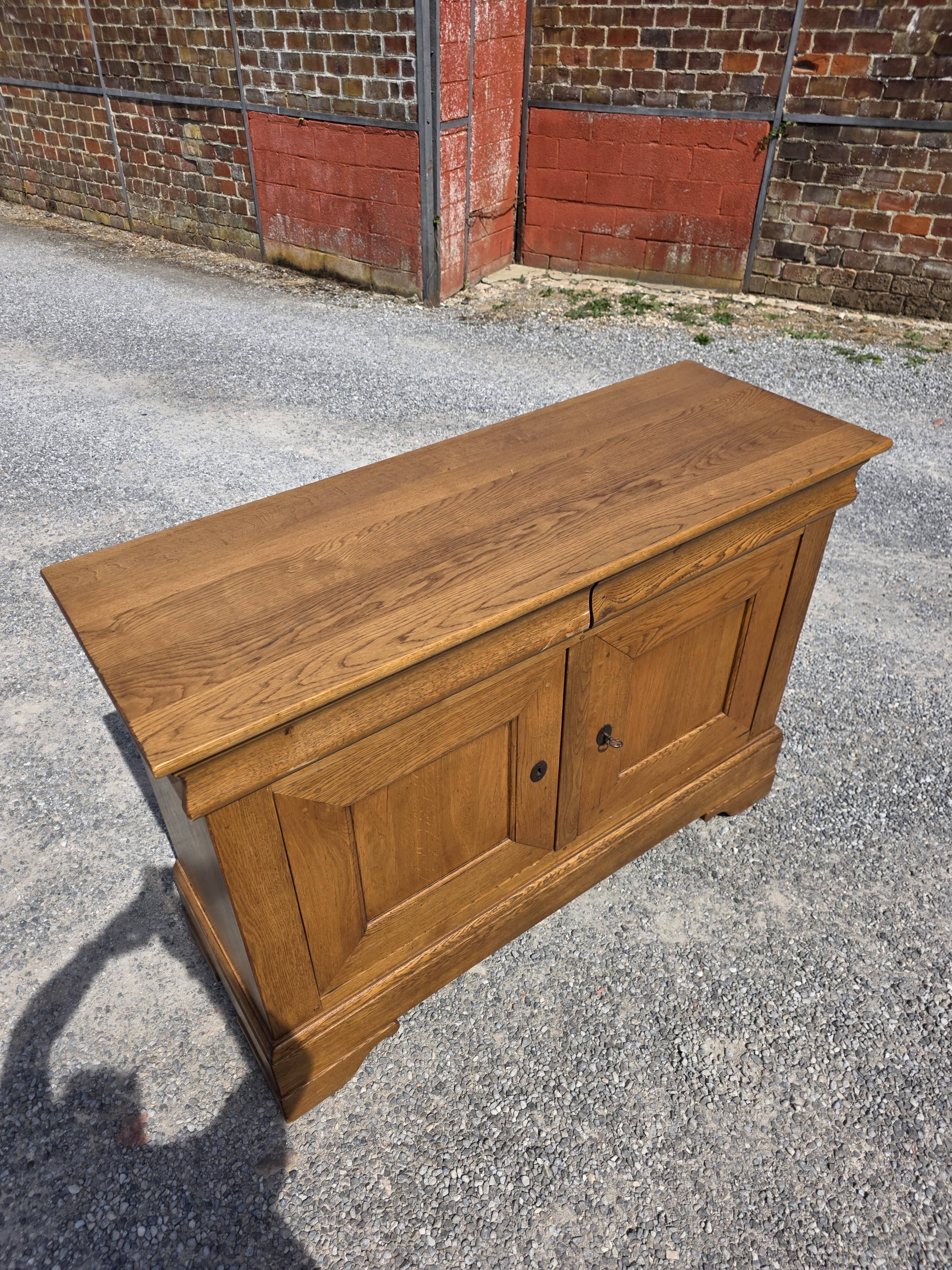 Louis Philippe buffet in solid oak.