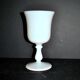 Ancient opaline white glass goblet with a soap bubble effect.