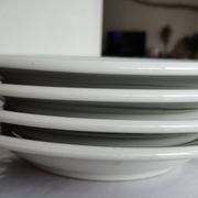 3 Pillivuyt white porcelain dinner plates with blue edging.